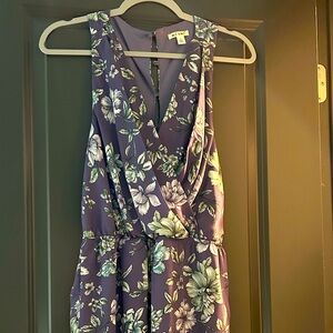 Gray jumpsuit with blue and white floral pattern